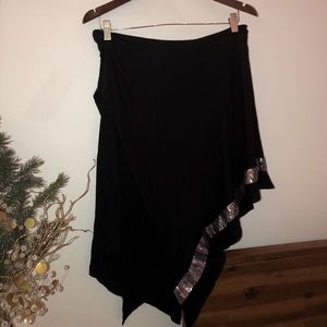 Mid-length black skirt with silver design